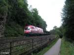 1116 005-8 zieht ein Leeren Autotransportzug bei Regensburg.