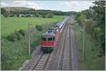 Die SBB Re 4/4 II 11301 ist bei Bietingen (D) mit einen IC4 von Singen nach Zürich unterwegs.