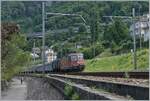 Die SBB Re 4/4 II 11278 (Re 420 278-4) ist mit einem Güterzug bei Villeneuve unterwegs.