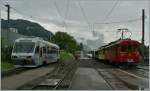 Bunte Schmalspurbahn Ambiente mit dem einfahrenden CEV Beh 2/4 72, dem abgestellten BDeh 2/4 75 und dem B-C RhB Bernina ABe 4/4 N� 35.