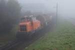 ASm: Herbstliche Morgenstimmung mit ASm Oelzug auf dem Drei-Schienen-Geleise bei Niederbipp.