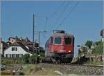 Hier nochmals die SBB Re 6/6 11669 (Re 620 069-5 )  Hägendorf  mit etwas mehr Umfeld als Lokzug zwischen Ligerz und Twann auf der Fahrt in Richtung Biel/Bienne. 

11. Juli 2025