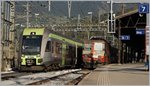 Die Swiss Express Re 4/4 II 11109 ist mit ihrem IR in Brig eingetroffen und wird später wieder nach Domodossola zurückfahren, derweil erreichen zwei Lötschberger ihre Ziel.