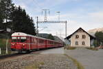 Nahverkehrszug in Madulain, Engadin, Steuerwagen Nr.1721 und Ge 4/4 I U Nr.602 am 17.08.2009.