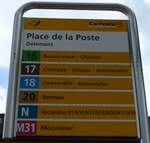 (151'055) - PostAuto-Haltestellenschild - Delmont, Place de la Poste - am 29.