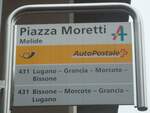 (147'763) - PostAuto-Haltestellenschild - Melide, Piazza Moretti - am 6.