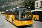 (069'810) - PostAuto Oberwallis - VS 243'891 - Neoplan (ex P 27'004) am 31. Juli 2004 beim Bahnhof Brig