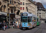 BVB: Be 4/4 494 + B der Linie 16 bei der Haltestelle Rathausplatz am 5.