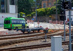 Der zweiachsige (TPC) Trag-/Flachwagen ASD Lb 853 abgestellt am 28.05.2023 im Bahnhof Aigle.