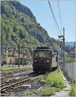 Die BLS Re 4/4 178  Schwarzenburg verlässt mit ihrem Tunnleautozug Iselle in Richtung Brig, Das Bild entstand am Ende des neu errichtete und zum Fotografieren sehr störende Zauns.