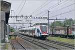 Der SBB LEX RABe 522 226 ist als RL5 auf dem Weg von Gen�ve nach La Plaine und f�hrt ohne Halt durch den ehemaligen Bahnhof Vernier-Meyrin, der heute Vernier Meyrin Cargo heisst und nur noch dem G�terverkehr dient. 

29. April 2026