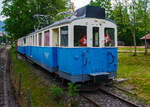 Ehemaliger MOB Triebzug De 4/4 26 mit B4 61 am 28.05.2012 in Saanen, aufgenommen aus fahrendem Zug.