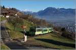 Der AOMC Beh 4/8 592, unterwegs als Regioanlzug 29 von Champéry nach Aigle hat die Haltestelle  Pont de Chemex  verlassen und führt nun Richtung Monthey-Ville.