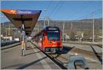 In Glovelier wartet der CJ ABe 4/8 672 als R36 nach La Chaux de Fonds auf die Abfahrt.
