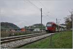 Ein TPF SURF ABe 2/4 - B - Be 2/4 verlässt Châtel-St-Dennis in Richtung Bulle, im Hintergrund ist der neue Bahnhof im Bau.