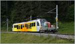 Der Be 4/6 102  Mönch  mit einem Vorstellwagen Lklp kurz nach der Abfahrt von der Grütschalp auf der Fahrt nach Mürren.