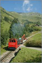 Die BRB Diesellok Hm 2/2 N 10 verlsst die Planalp mit einem Bauzug.