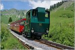 Die Brienz Rothorn Bahn BRB H 2/3 16 hat mit ihrem bergwärts fahrenden Zug Planalp verlassen.