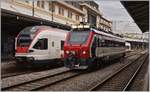 Der SBB Infrastrukturdiagnose XTmas 99 85 9 160-5 und der bewegungsunscharfe, da ausfahrende SBB RABe 523 024 in Lausanne.