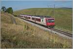 Ein TRAVYS RBDe 560  Domino  ist als Regionalzug von Le Brassus nach Vallorbe kurz vor Le Charbonnières unterwegs.

21. Juli 2022