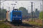 Metrans 185 511-3 mit einem Container-Zug am 05.09.2014 durch Uelzen (NVR-Nummer 91 80 6185 511-3 D-MTR)